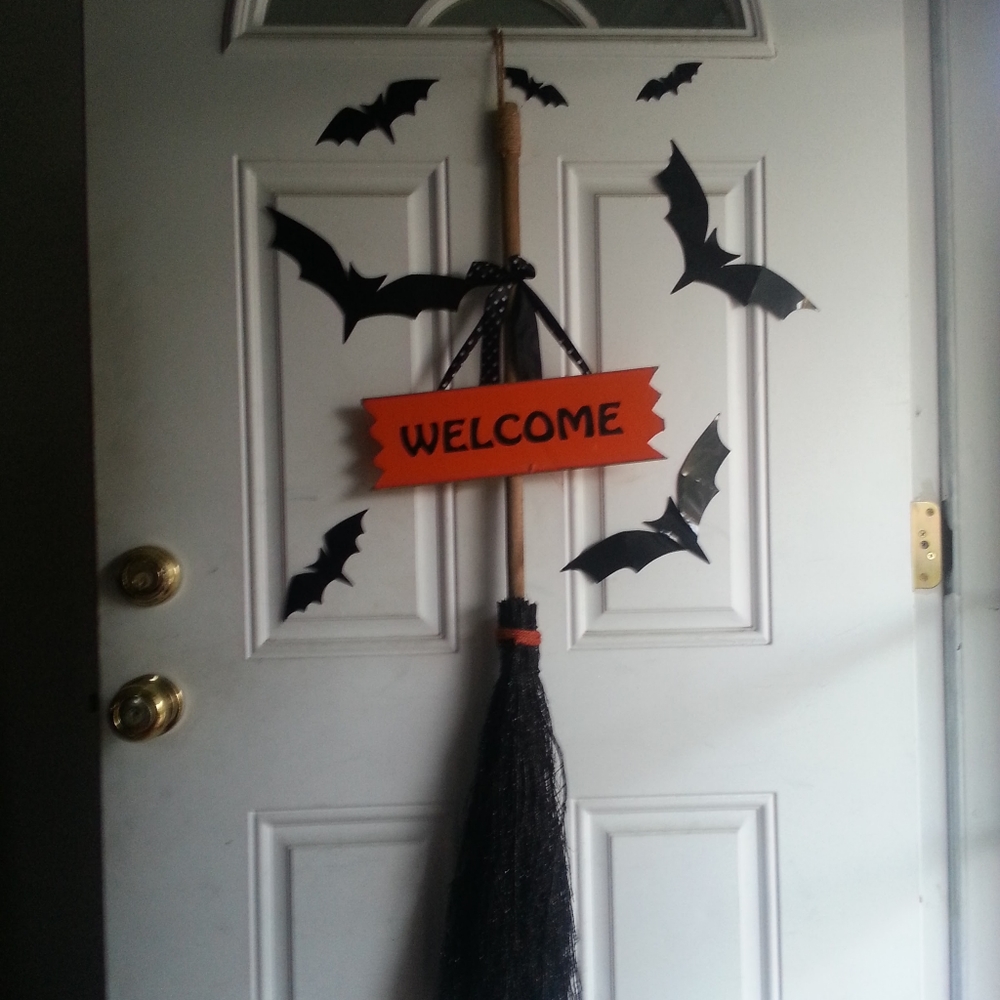 Halloween broom welcome sign